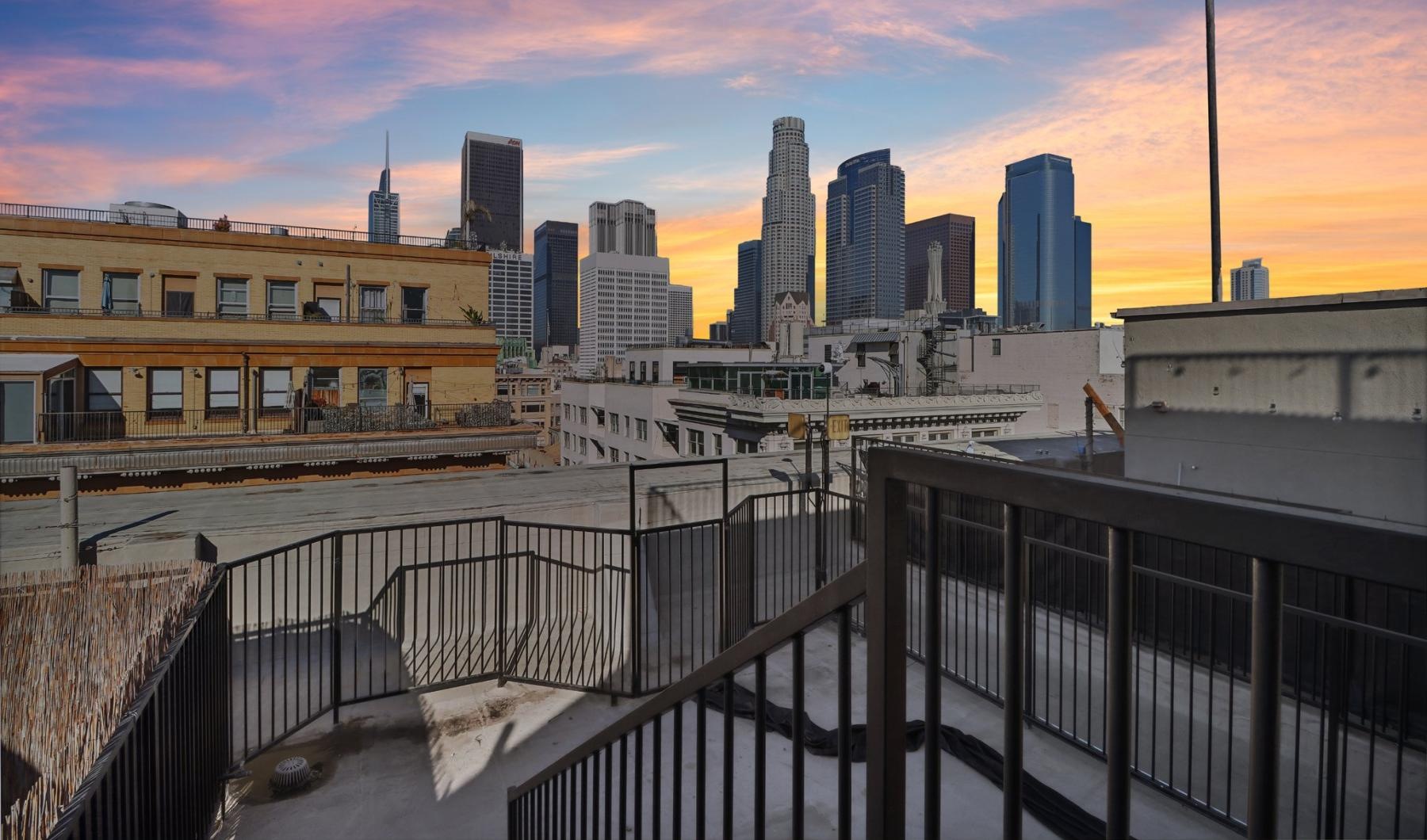 Settle into comfort at Jaide Lofts a city skyline with a bridge