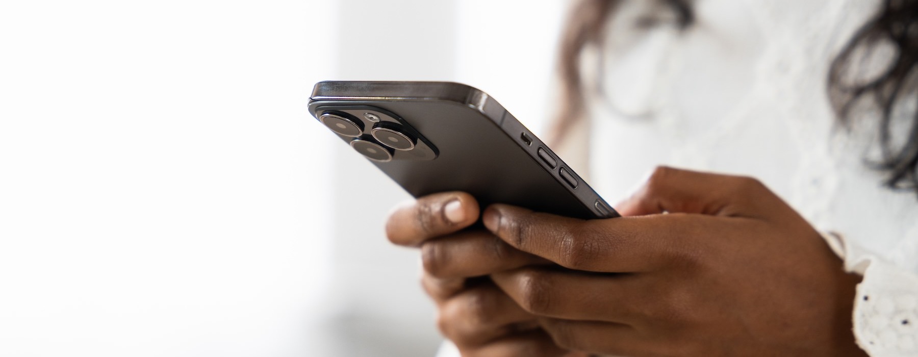 a woman holding a phone