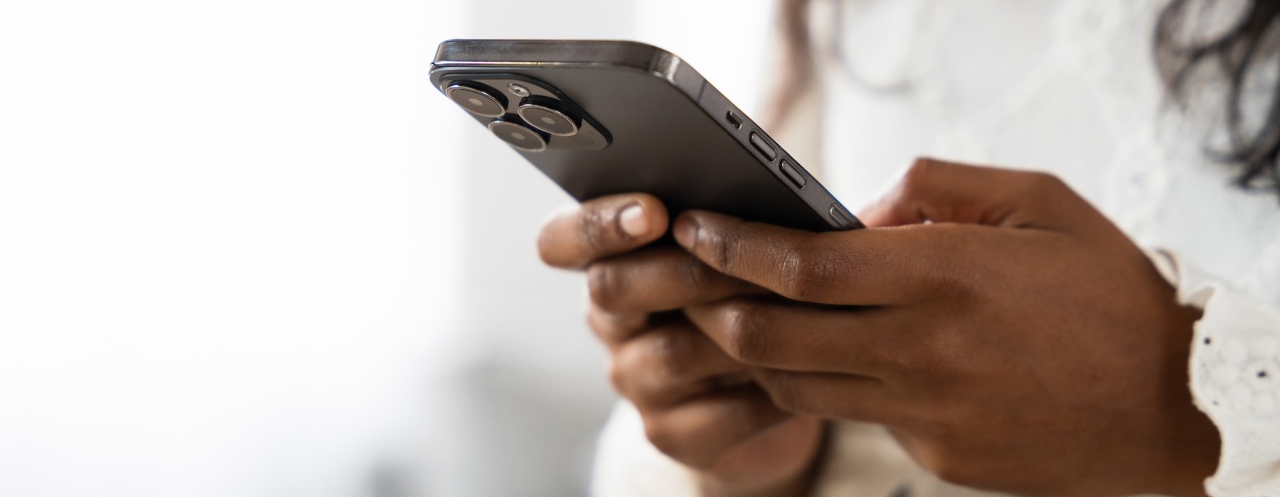 a woman holding a phone