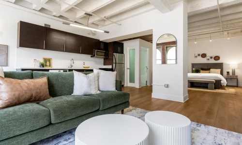 a living room with a couch and a table